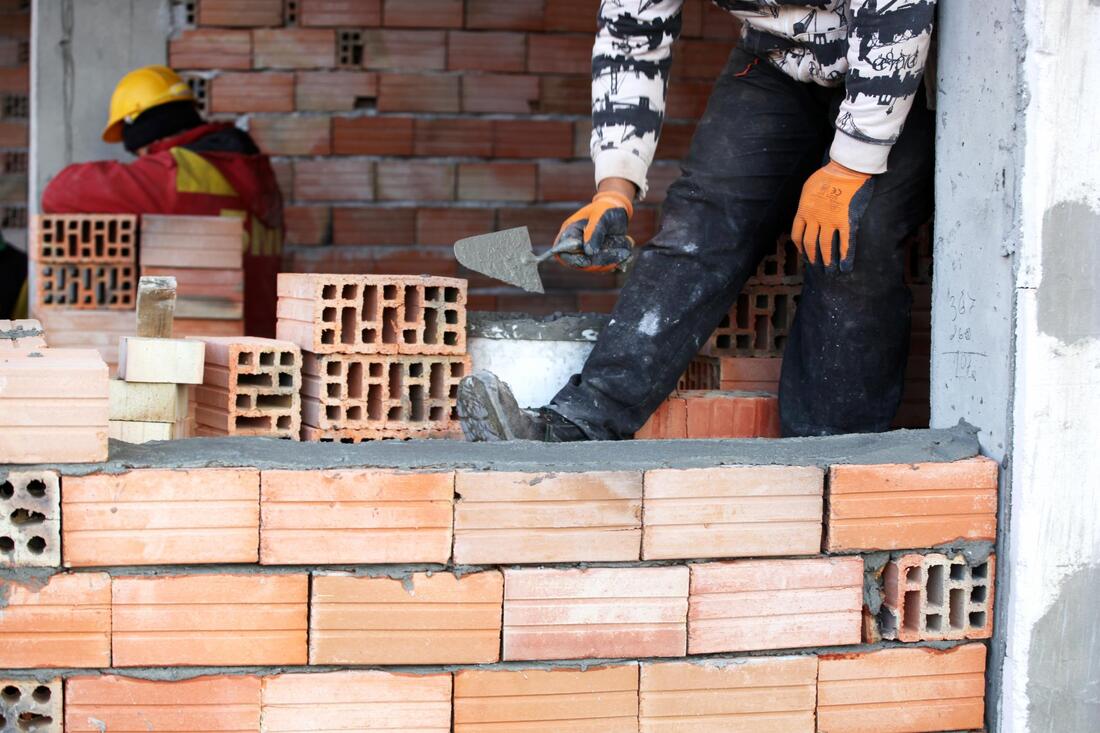 men installing a bricks